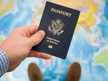 image of a hand holding a US passport